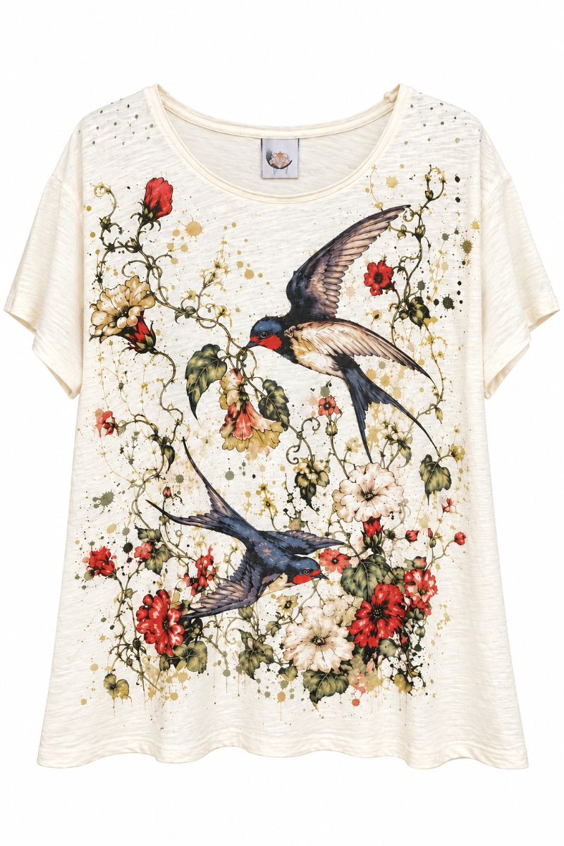 Trestles Clothing Company oversized cream cotton tee featuring a vintage swallow and floral garden graphic print.